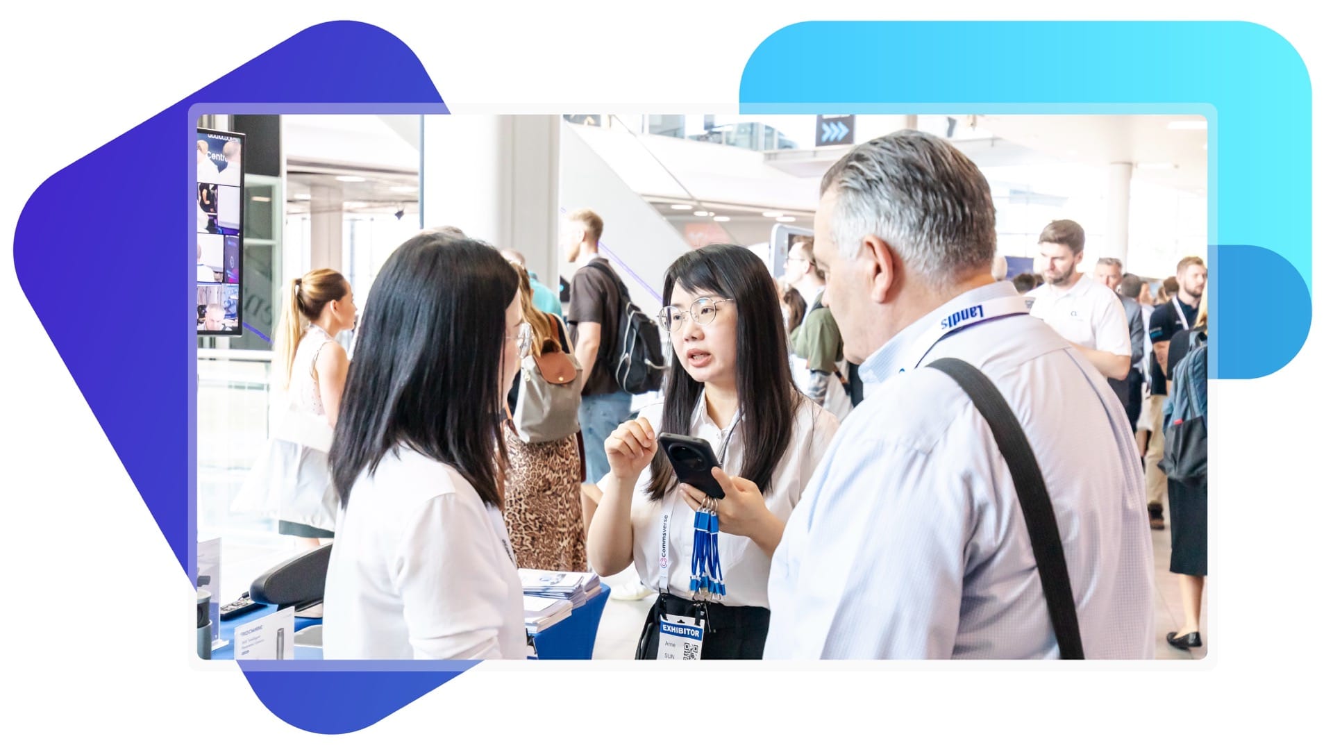 Exhibitor scanning an attendee's badge using Just Attend's mobile app.